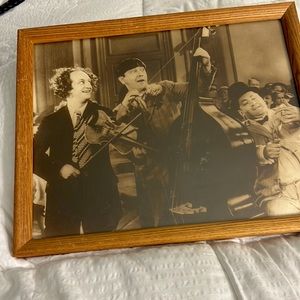 Black and white picture of the Three Stooges not signed. Picture is framed